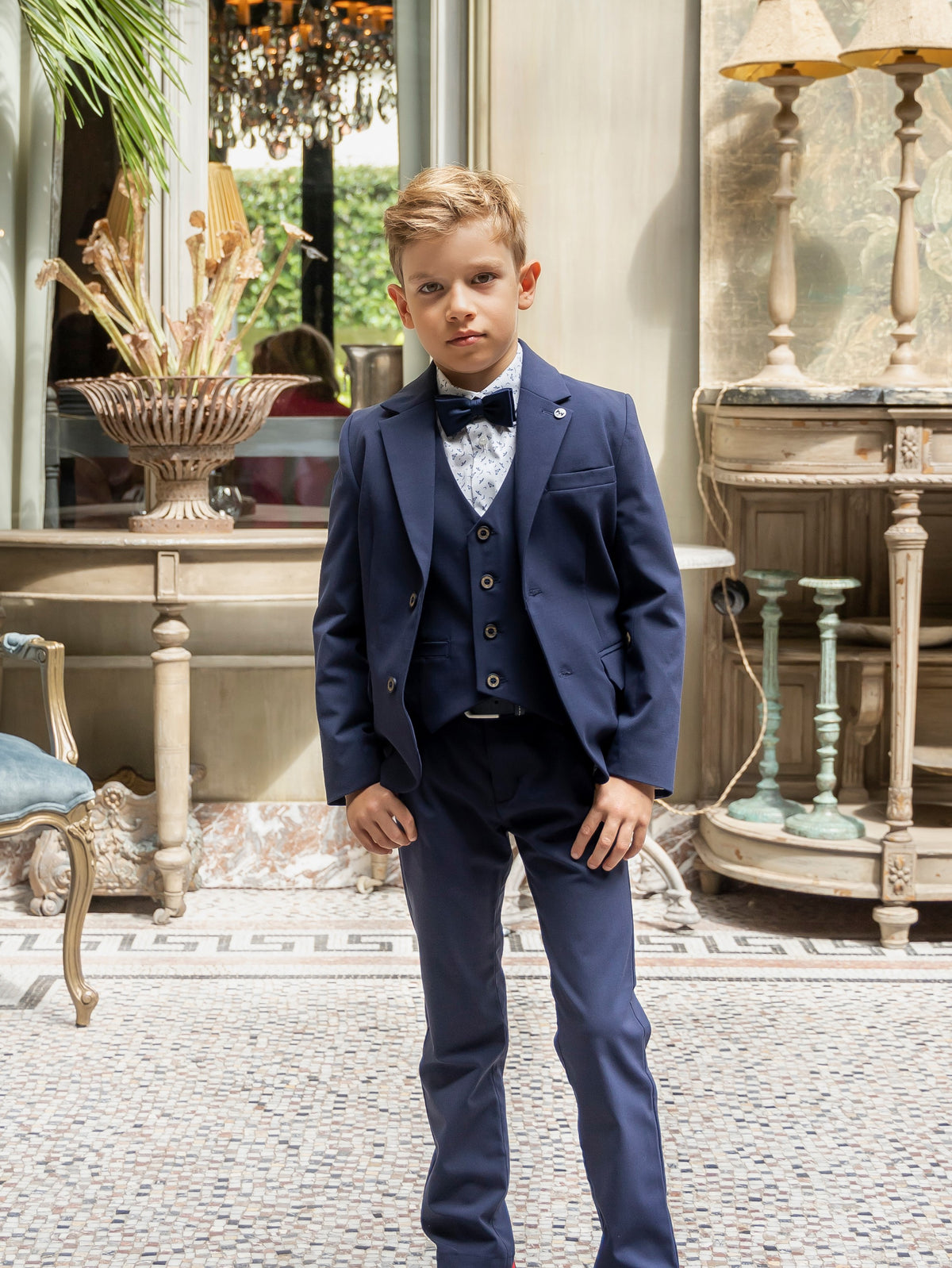 Three-piece blue suit with subtle checkered pattern